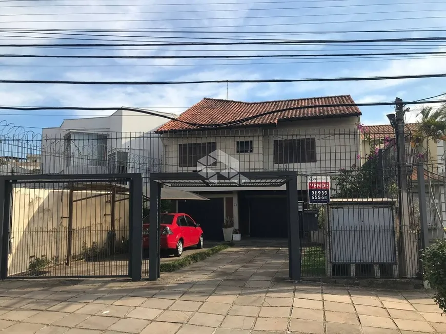 Foto 1 de Casa com 6 Quartos à venda, 459m² em Jardim São Pedro, Porto Alegre