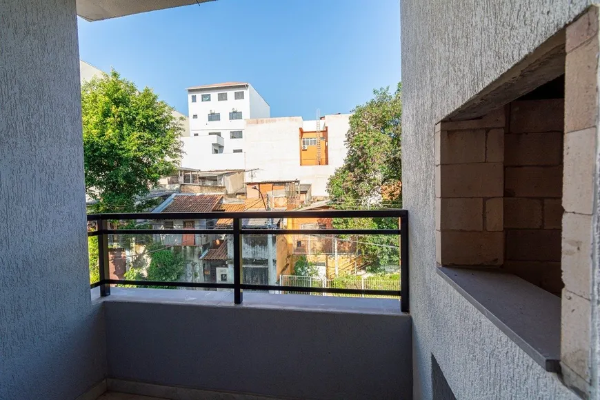 Foto 1 de Apartamento com 2 Quartos à venda, 60m² em Vila Monte Carlo, Cachoeirinha