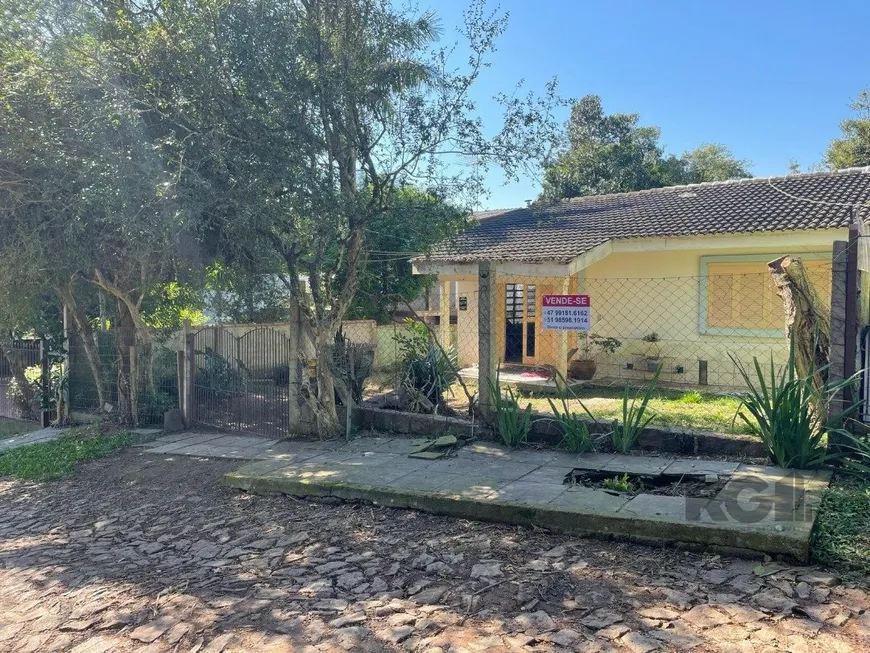 Foto 1 de Casa com 6 Quartos à venda, 199m² em Ponta Grossa, Porto Alegre