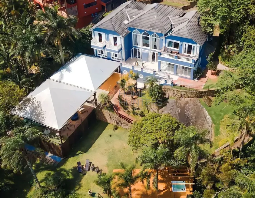 Foto 1 de Casa com 9 Quartos à venda, 1000m² em Cacupé, Florianópolis