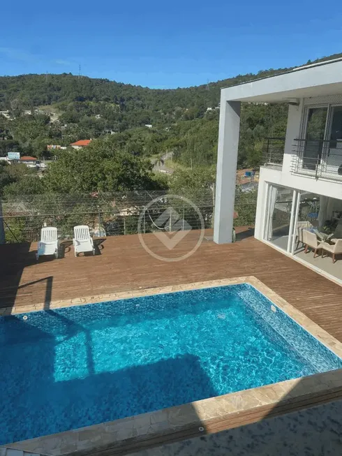 Foto 1 de Casa de Condomínio com 4 Quartos à venda, 343m² em Itacorubi, Florianópolis