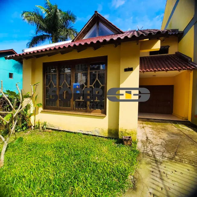 Foto 1 de Casa de Condomínio com 3 Quartos à venda, 190m² em Cavalhada, Porto Alegre