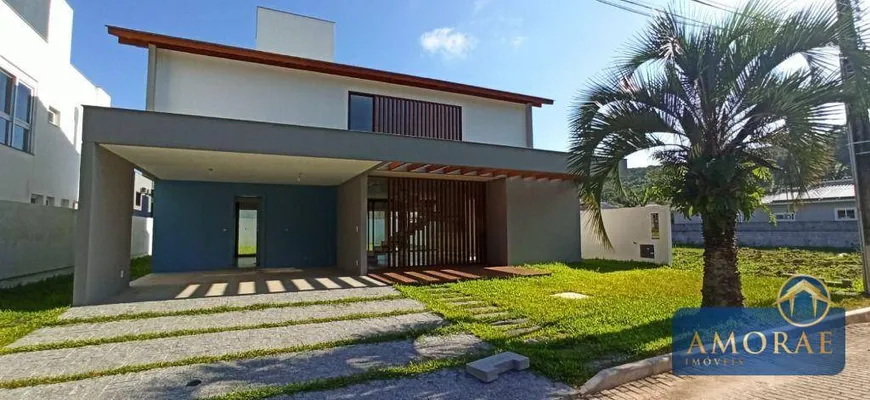 Foto 1 de Casa de Condomínio com 4 Quartos à venda, 236m² em Cachoeira do Bom Jesus, Florianópolis