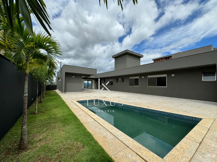 Foto 1 de Casa de Condomínio com 4 Quartos à venda, 390m² em Condominio Quintas do Sol, Nova Lima