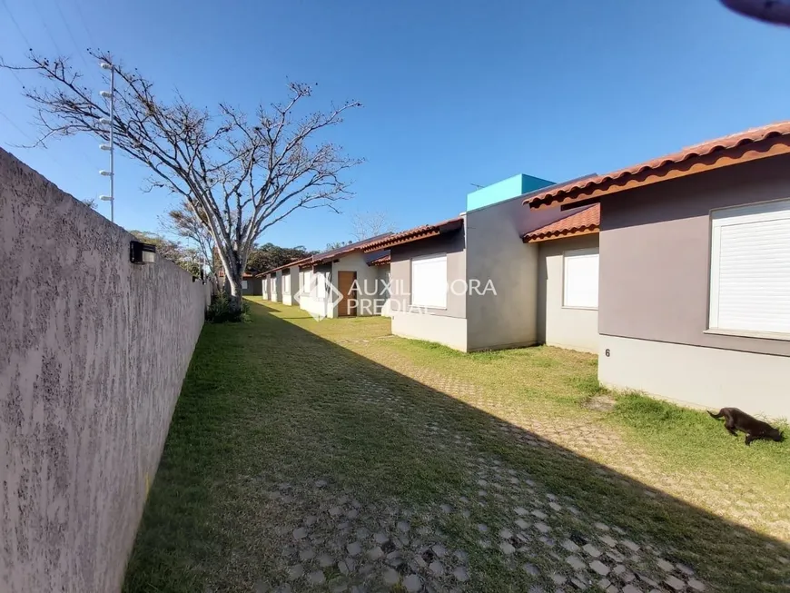 Foto 1 de Casa de Condomínio com 2 Quartos à venda, 60m² em Ponta Grossa, Porto Alegre