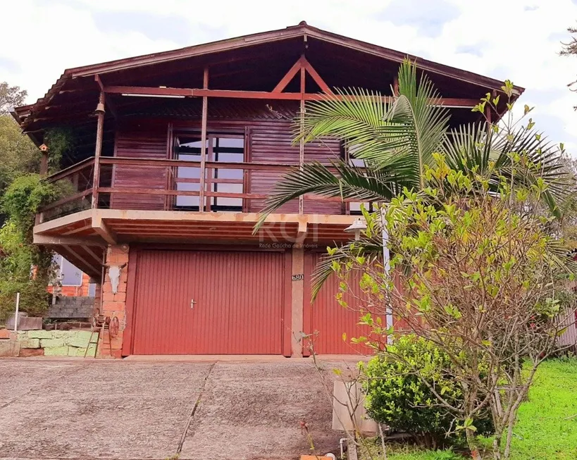 Foto 1 de Casa com 3 Quartos à venda, 119m² em Krahe, Viamão