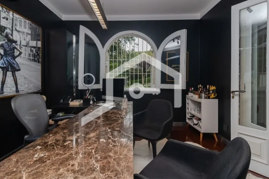 Foto 1 de Casa com 4 Quartos à venda, 439m² em Pacaembu, São Paulo