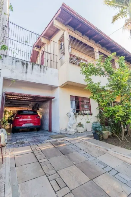 Foto 1 de Casa com 4 Quartos à venda, 215m² em Santa Tereza, Porto Alegre