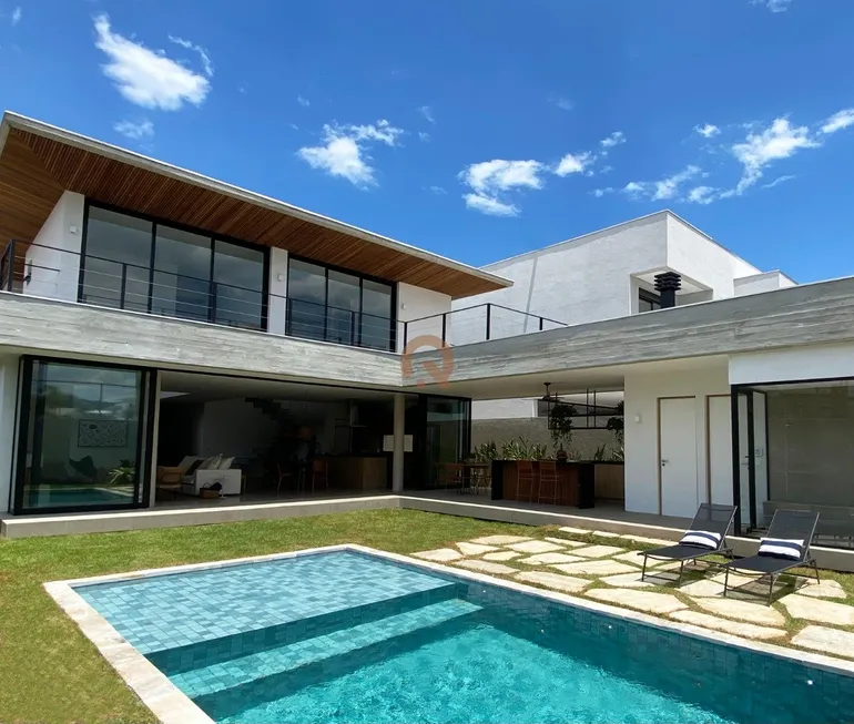 Foto 1 de Casa com 5 Quartos à venda, 450m² em Jardim Acapulco , Guarujá