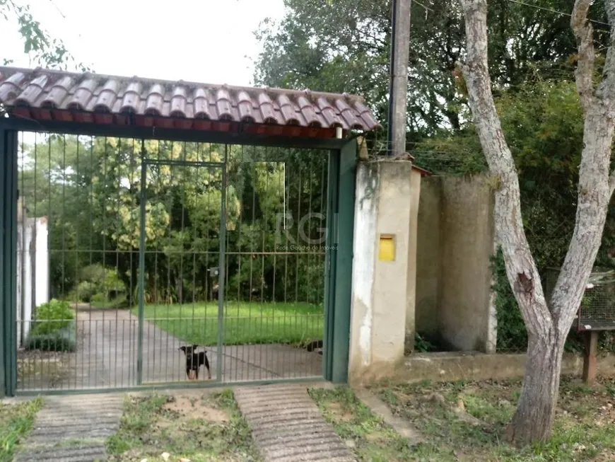 Foto 1 de Fazenda/Sítio com 3 Quartos à venda, 299m² em Krahe, Viamão