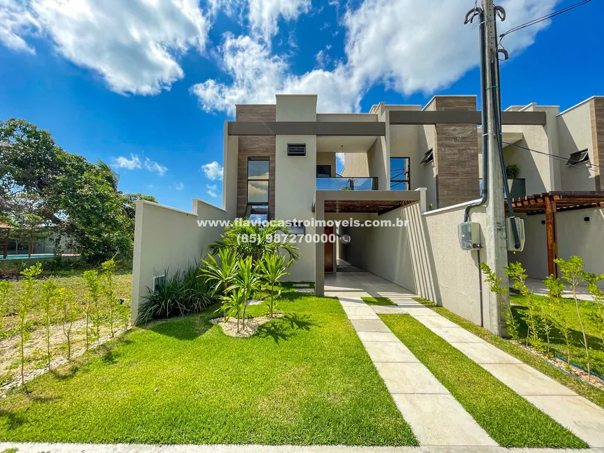 Foto 1 de Casa de Condomínio com 4 Quartos à venda, 128m² em Centro, Aquiraz