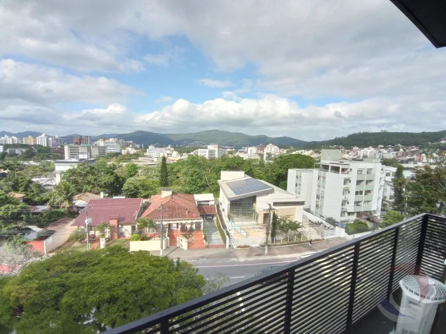 Foto 1 de Apartamento com 2 Quartos à venda, 63m² em Carvoeira, Florianópolis
