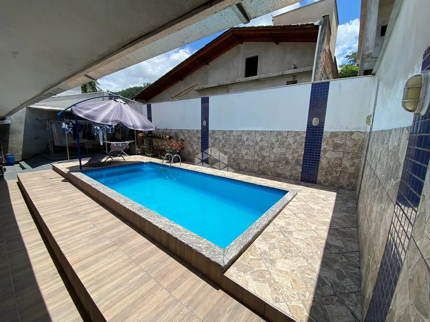 Foto 1 de Casa com 4 Quartos à venda, 191m² em Jaragua Noventa E Nove, Jaraguá do Sul