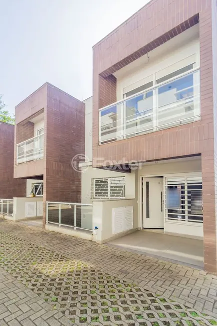 Foto 1 de Casa de Condomínio com 3 Quartos à venda, 250m² em Praia de Belas, Porto Alegre