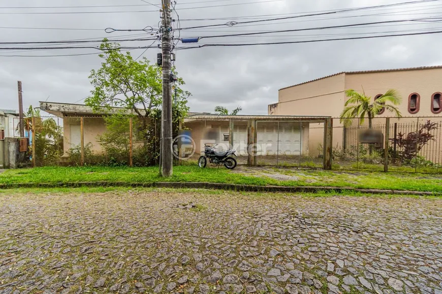 Foto 1 de Casa com 5 Quartos à venda, 300m² em Vila Assunção, Porto Alegre