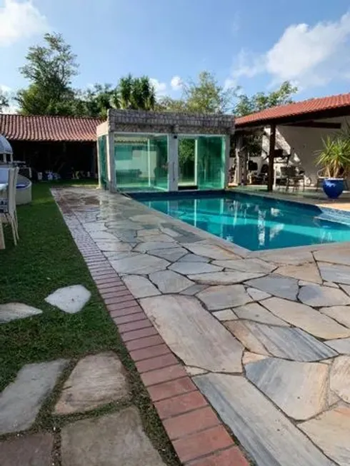 Foto 1 de Casa com 3 Quartos à venda, 410m² em Camboinhas, Niterói