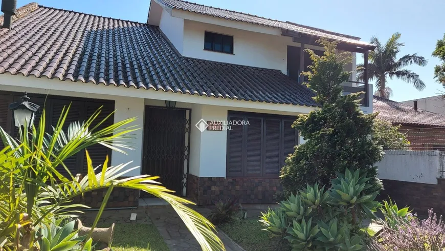 Foto 1 de Casa com 3 Quartos à venda, 158m² em Guarujá, Porto Alegre