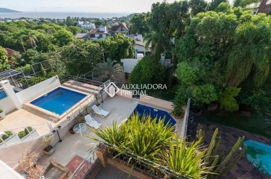 Foto 1 de Casa com 4 Quartos à venda, 474m² em Jardim Isabel, Porto Alegre