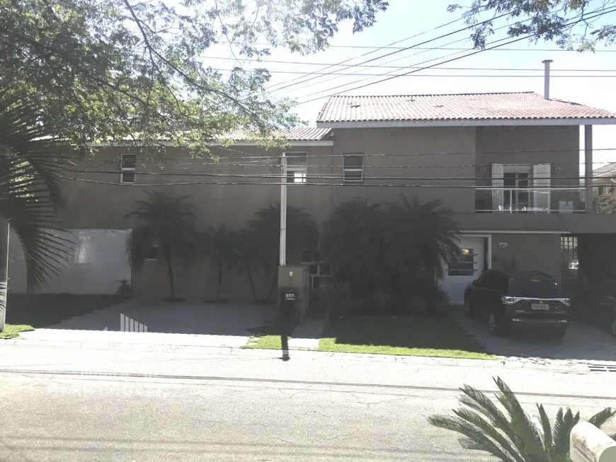 Foto 1 de Casa de Condomínio com 7 Quartos à venda, 620m² em Alphaville, Santana de Parnaíba