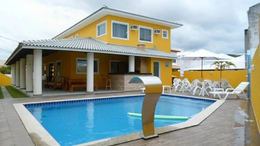 Foto 1 de Casa de Condomínio com 7 Quartos para venda ou aluguel, 500m² em Guarajuba Monte Gordo, Camaçari