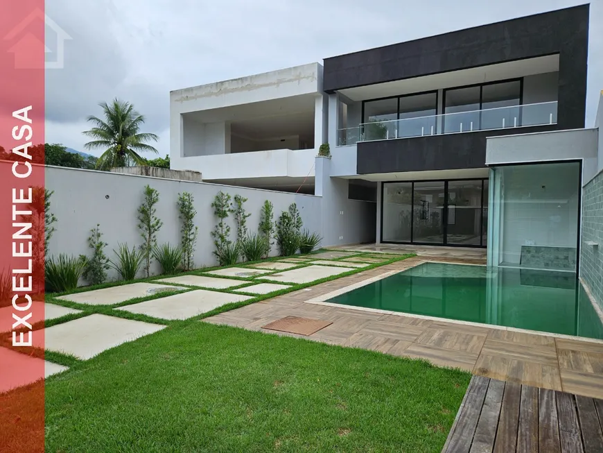 Foto 1 de Casa de Condomínio com 4 Quartos à venda, 365m² em Barra da Tijuca, Rio de Janeiro