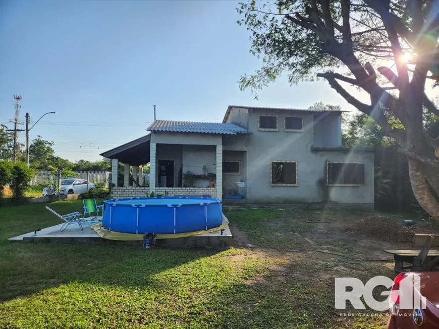 Foto 1 de Sobrado com 4 Quartos à venda, 179m² em Lageado, Porto Alegre