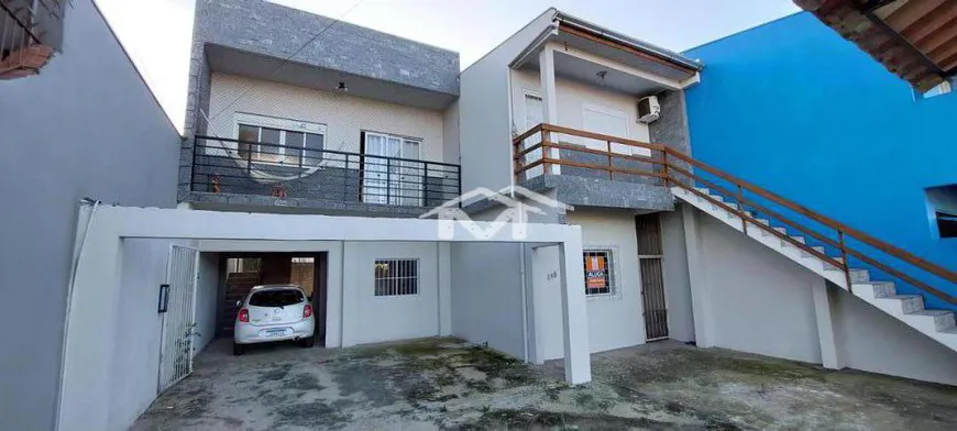 Foto 1 de Casa com 4 Quartos à venda, 125m² em Guajuviras, Canoas