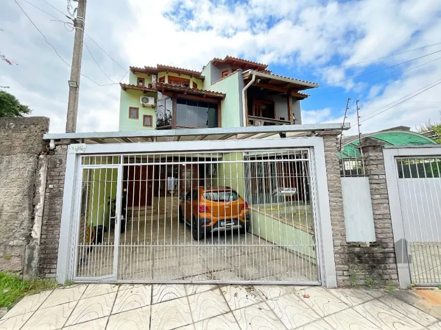 Foto 1 de Sobrado com 4 Quartos à venda, 218m² em Ipanema, Porto Alegre