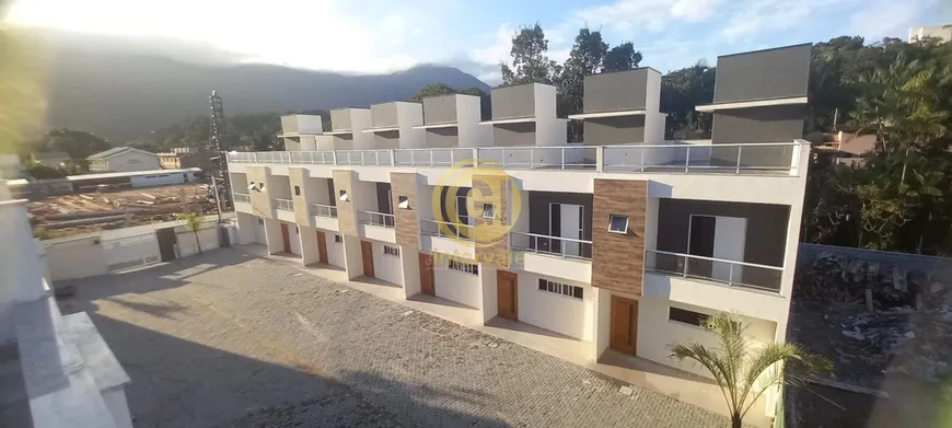 Foto 1 de Casa de Condomínio com 3 Quartos à venda, 138m² em Balneario Gardem Mar, Caraguatatuba