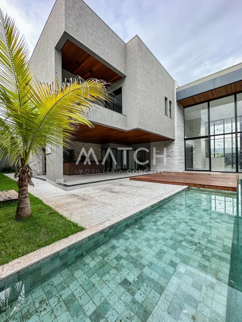 Foto 1 de Casa de Condomínio com 5 Quartos à venda, 585m² em Alphaville Flamboyant Residencial Araguaia, Goiânia