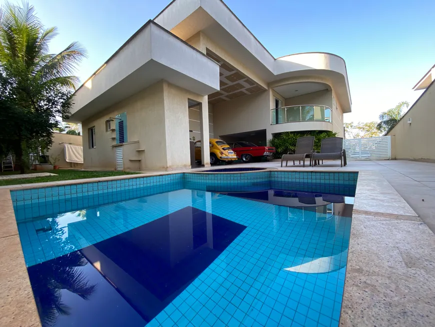 Foto 1 de Casa de Condomínio com 4 Quartos à venda, 420m² em Alphaville Ipe, Goiânia