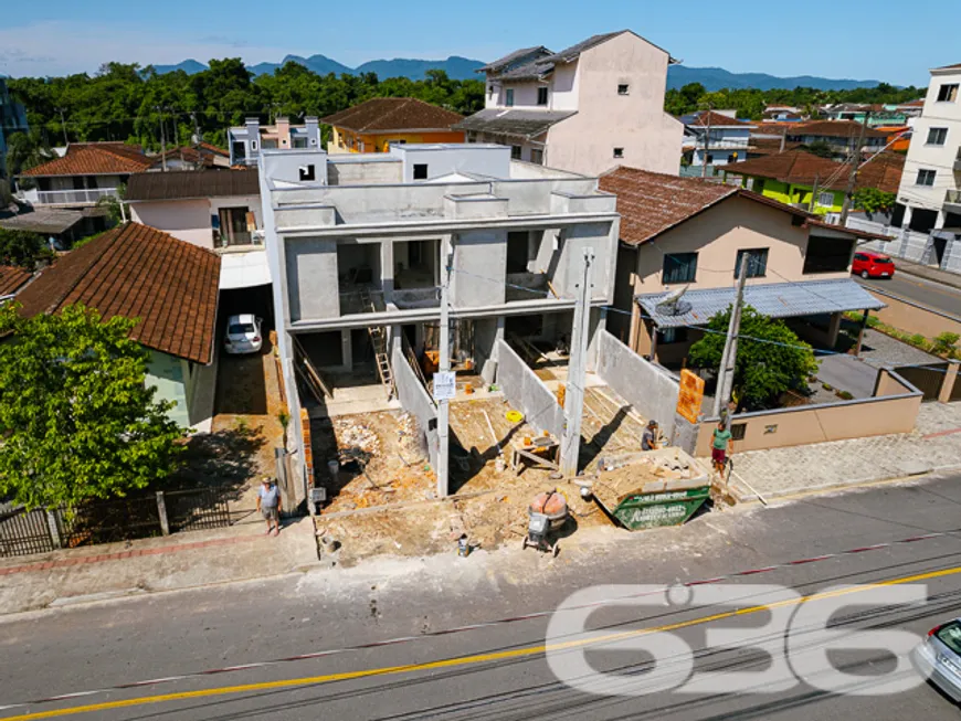 Foto 1 de Sobrado com 3 Quartos à venda, 118m² em Aventureiro, Joinville