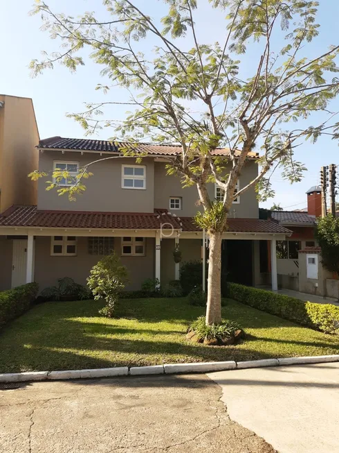 Foto 1 de Casa de Condomínio com 4 Quartos à venda, 200m² em Cavalhada, Porto Alegre