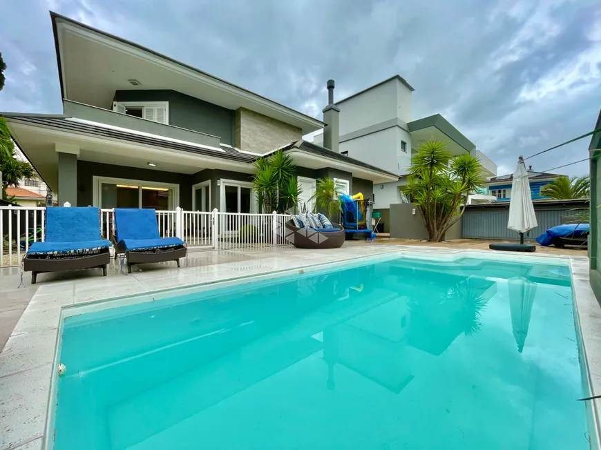 Foto 1 de Casa de Condomínio com 4 Quartos à venda, 340m² em Marechal Rondon, Canoas