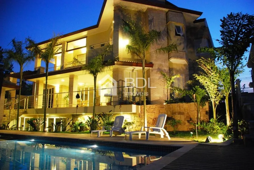 Foto 1 de Casa de Condomínio com 5 Quartos à venda, 652m² em Loteamento Alphaville Campinas, Campinas