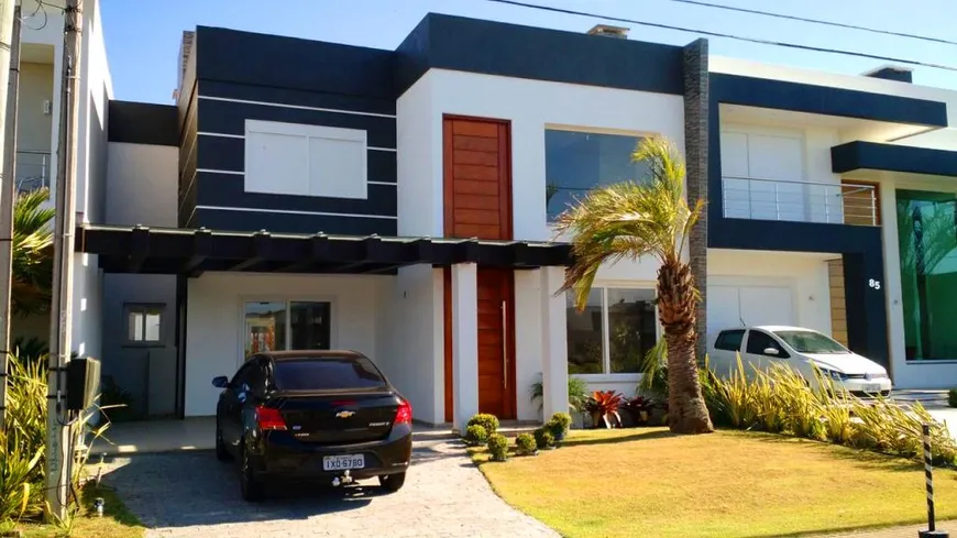Foto 1 de Casa de Condomínio com 4 Quartos à venda, 190m² em Condominio Las Palmas, Xangri-lá