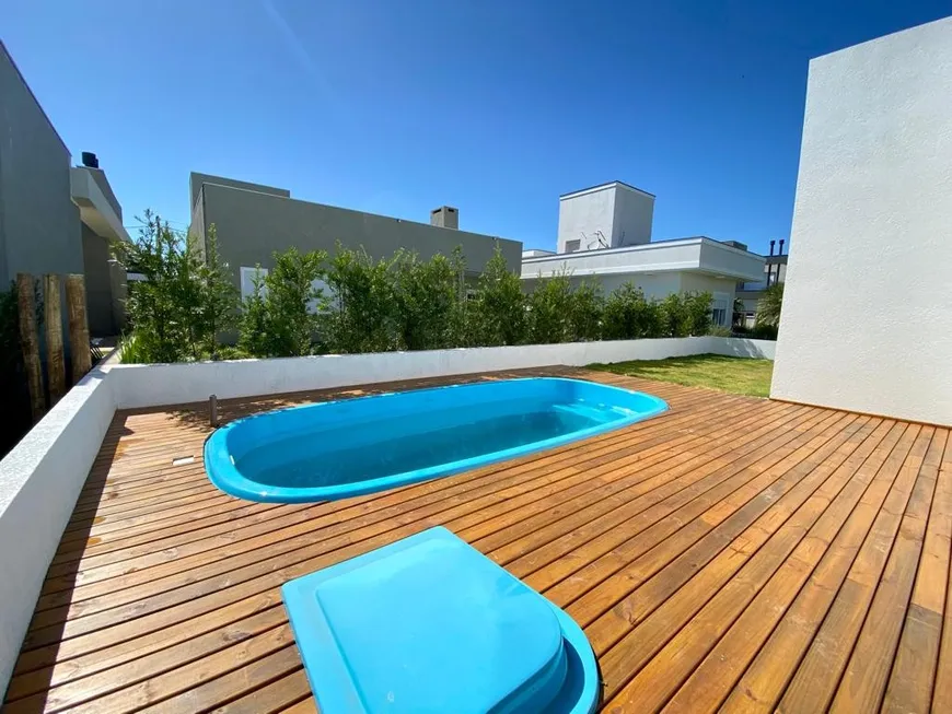 Foto 1 de Casa de Condomínio com 3 Quartos à venda, 180m² em Zona Nova, Capão da Canoa