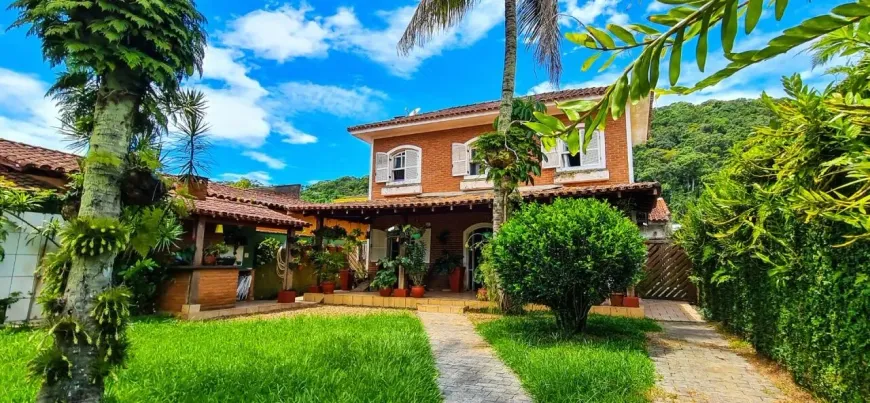 Foto 1 de Casa com 4 Quartos à venda, 310m² em Balneário Praia do Perequê , Guarujá