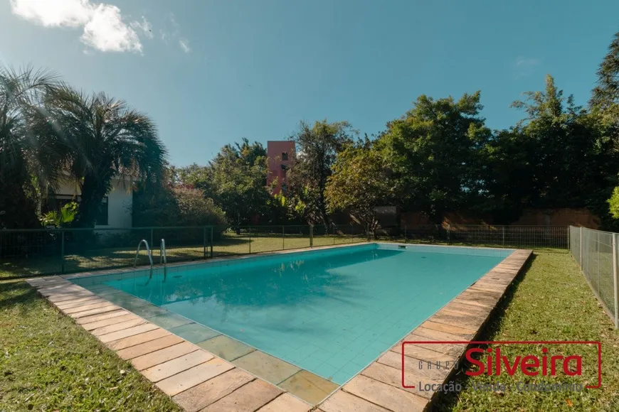Foto 1 de Casa com 4 Quartos para alugar, 401m² em Três Figueiras, Porto Alegre