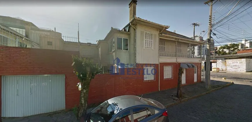 Foto 1 de Casa com 5 Quartos à venda, 180m² em Centro, Caxias do Sul