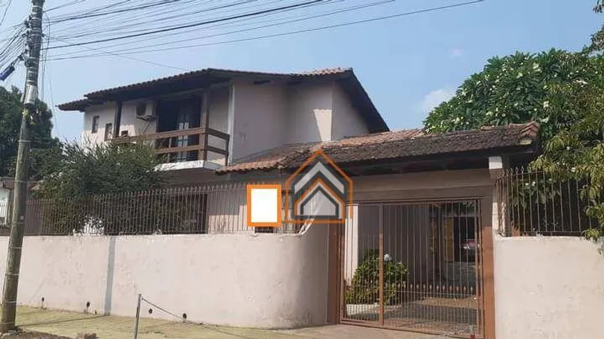 Foto 1 de Sobrado com 3 Quartos à venda, 200m² em Tarumã, Viamão