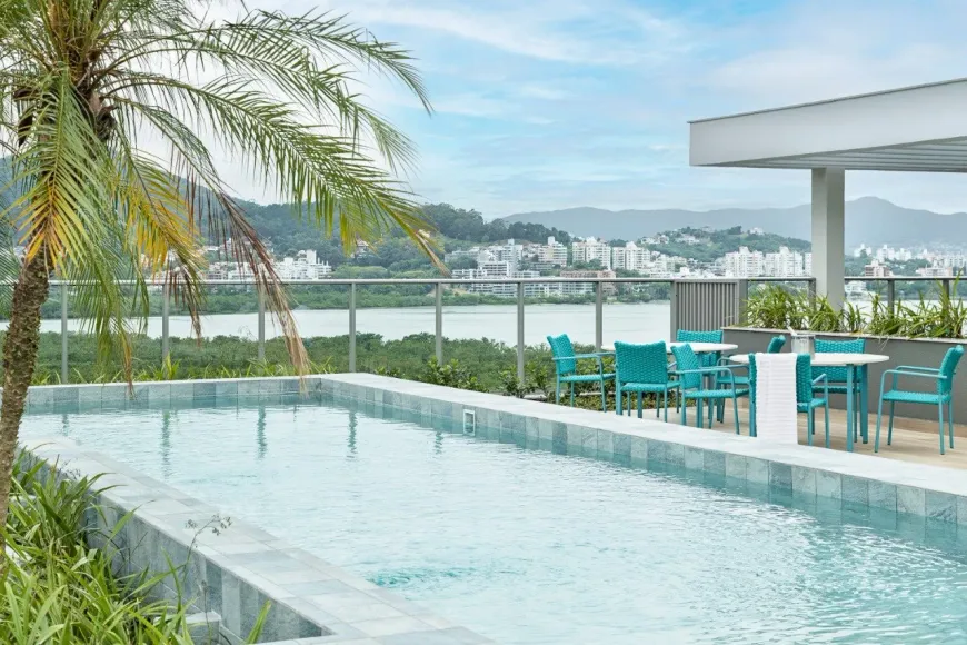 Foto 1 de Apartamento com 2 Quartos para alugar, 67m² em Cacupé, Florianópolis