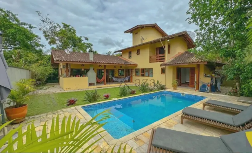 Foto 1 de Casa de Condomínio com 4 Quartos à venda, 195m² em Itamambuca, Ubatuba