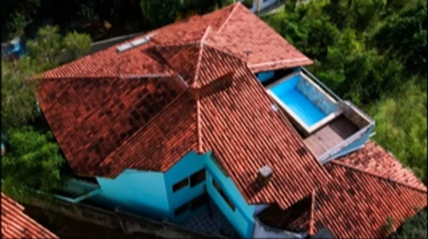 Foto 1 de Casa com 5 Quartos à venda, 545m² em Alto Cajueiros, Macaé