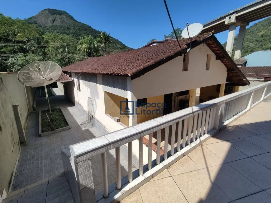 Foto 1 de Casa com 6 Quartos para venda ou aluguel, 450m² em Cidade Jardim, Caraguatatuba