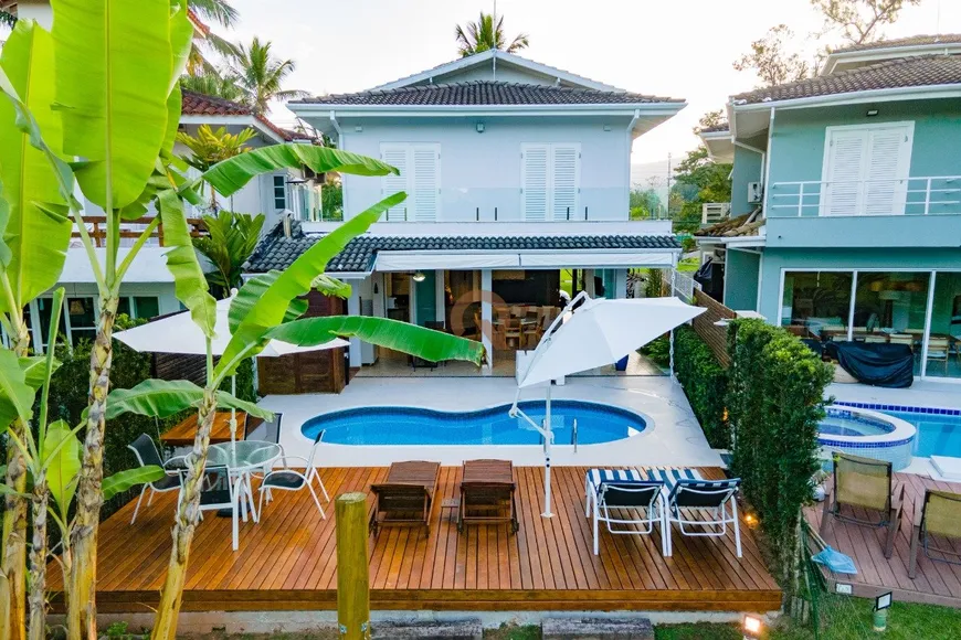 Foto 1 de Casa com 5 Quartos para venda ou aluguel, 196m² em Tabatinga, Caraguatatuba