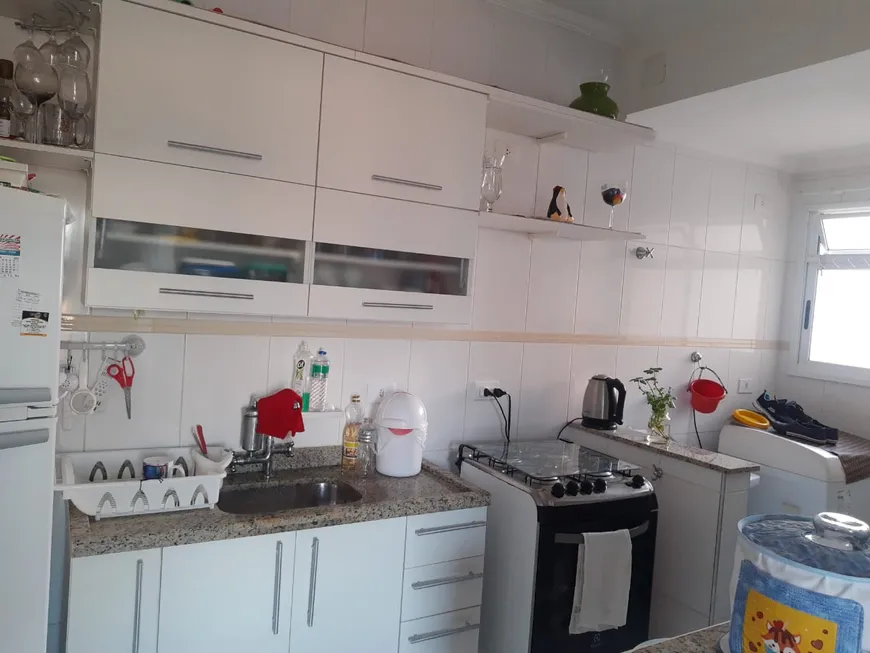 Foto 1 de Apartamento com 2 Quartos à venda, 58m² em Loteamento Mogilar, Mogi das Cruzes