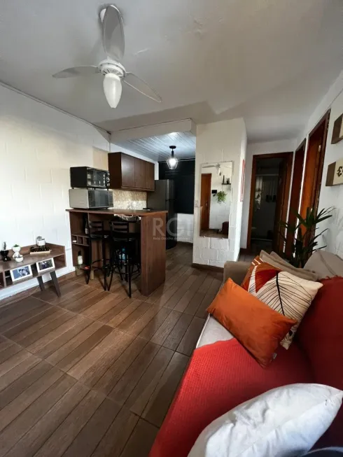 Foto 1 de Apartamento com 2 Quartos à venda, 39m² em Vila Nova, Porto Alegre