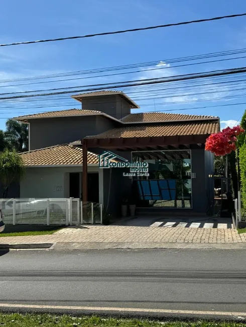 Foto 1 de Casa de Condomínio com 7 Quartos à venda, 1100m² em Condados de Bouganville, Lagoa Santa