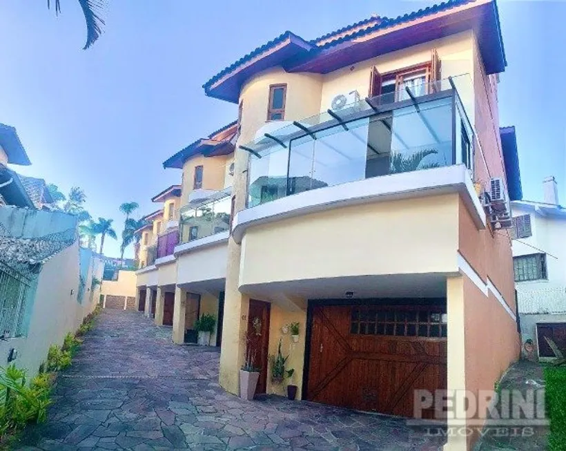 Foto 1 de Casa de Condomínio com 3 Quartos à venda, 241m² em Ipanema, Porto Alegre